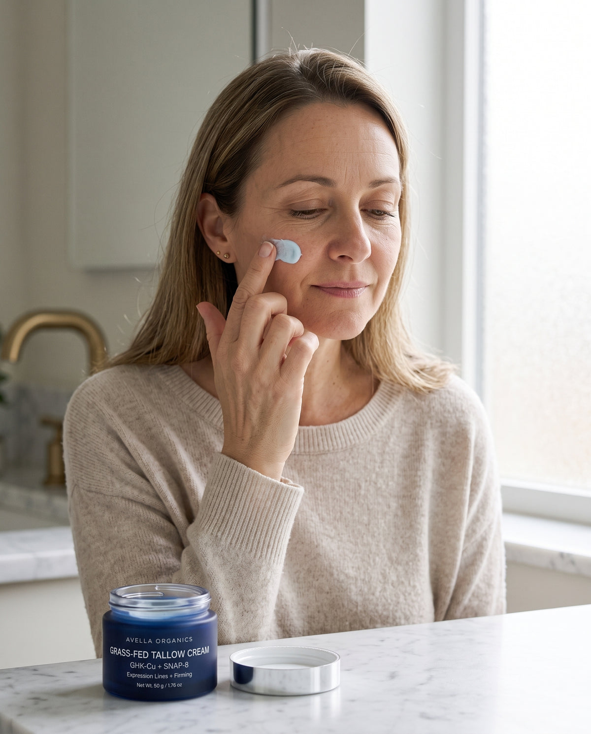 Applying Avella Organics tallow cream